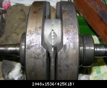 23597